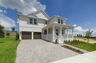 exterior of home with view of the garage