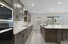 kitchen with view of the great room and access to the lanai