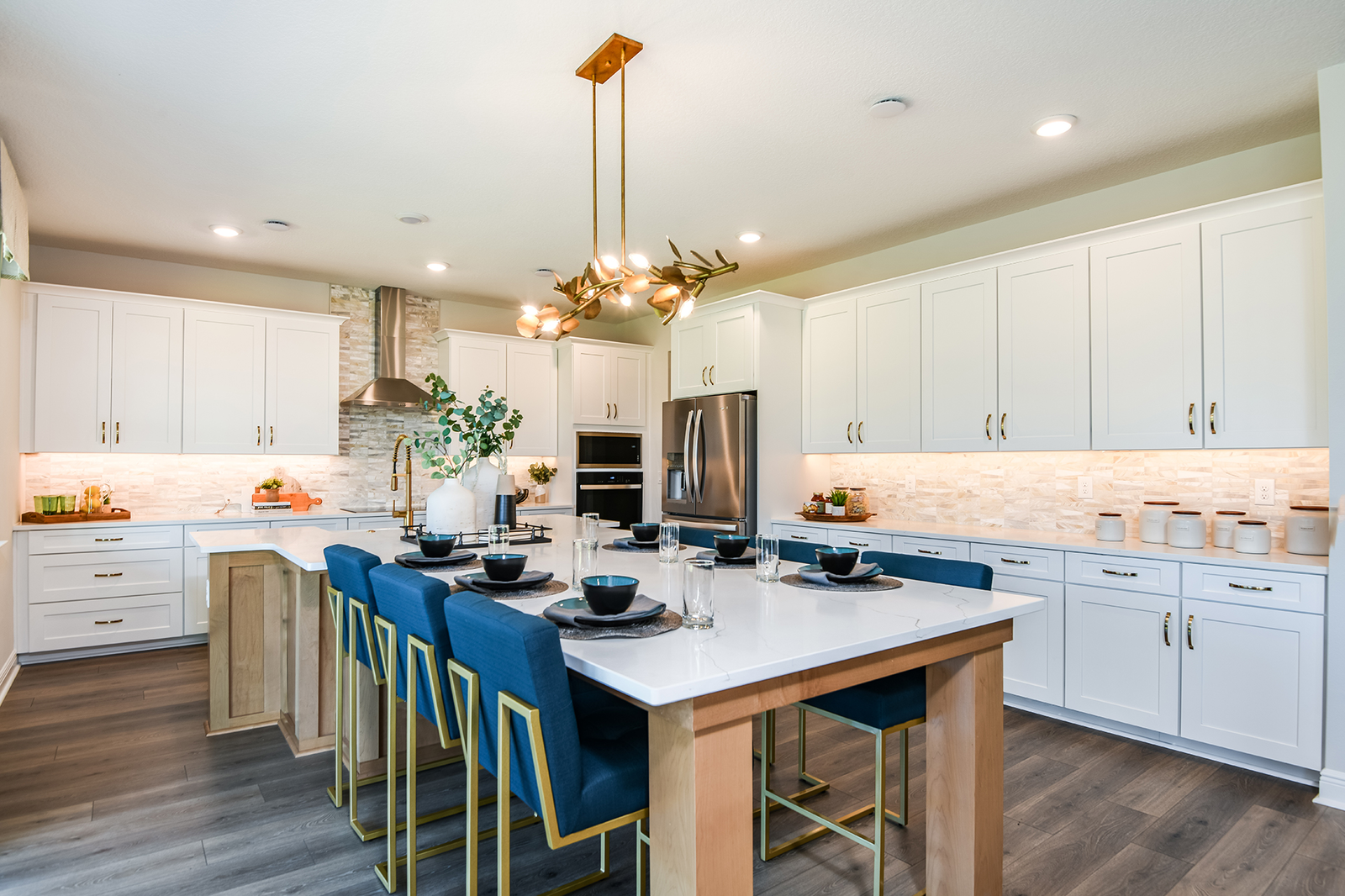 kitchen with oversized island and six chairs