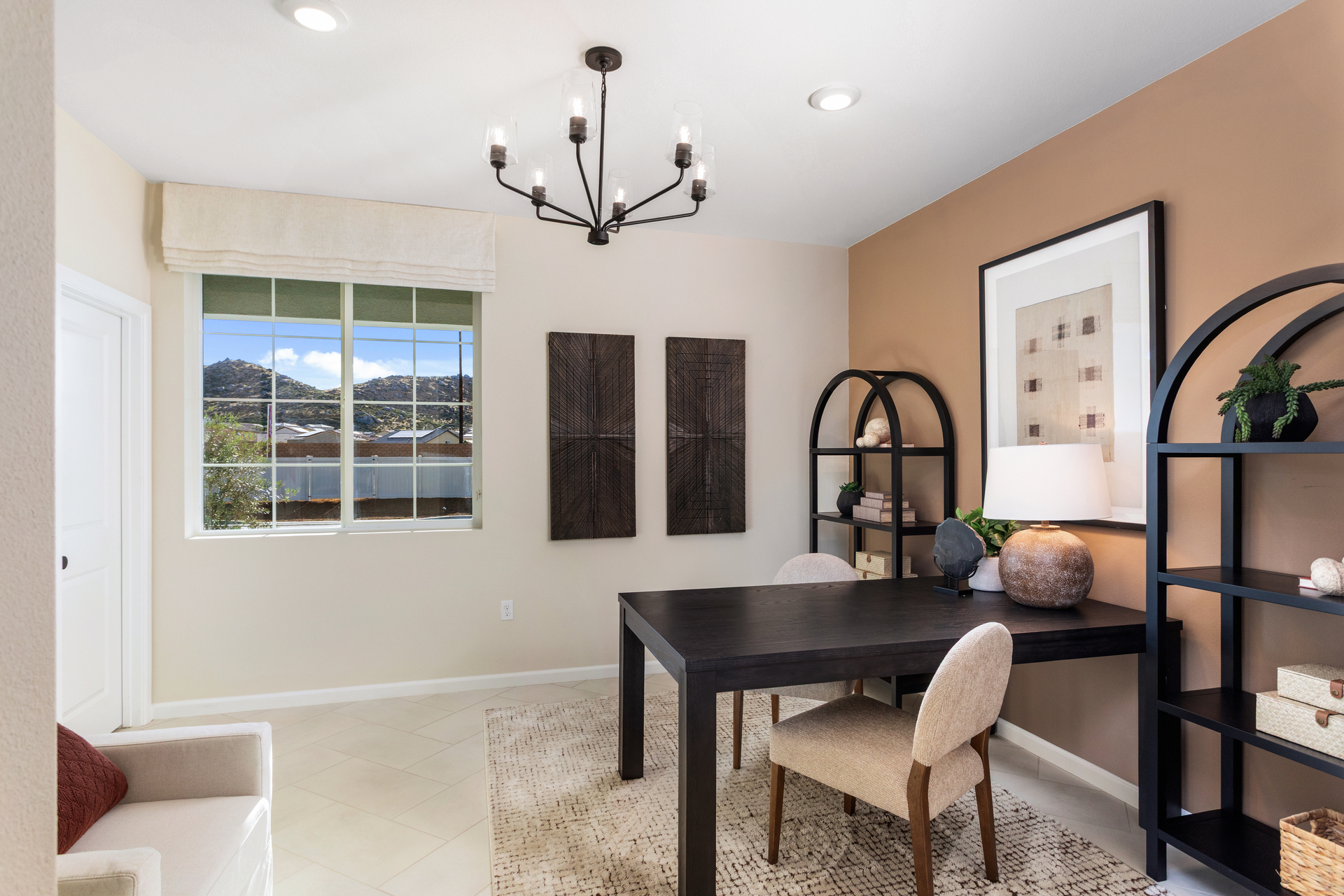 study with neutral flooring and large window