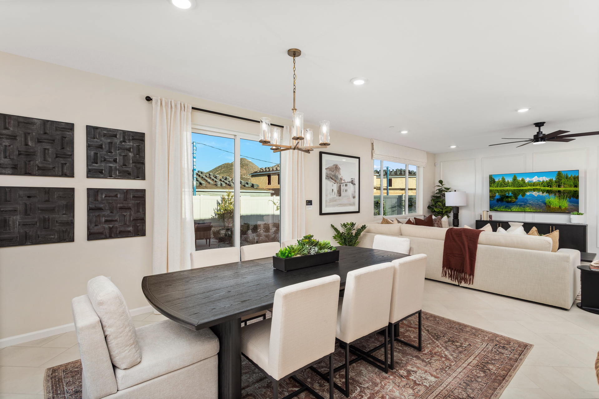 dining area with neutral floors and large windows