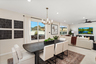 dining area with neutral floors and large windows