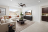 great room with large window and neutral floors