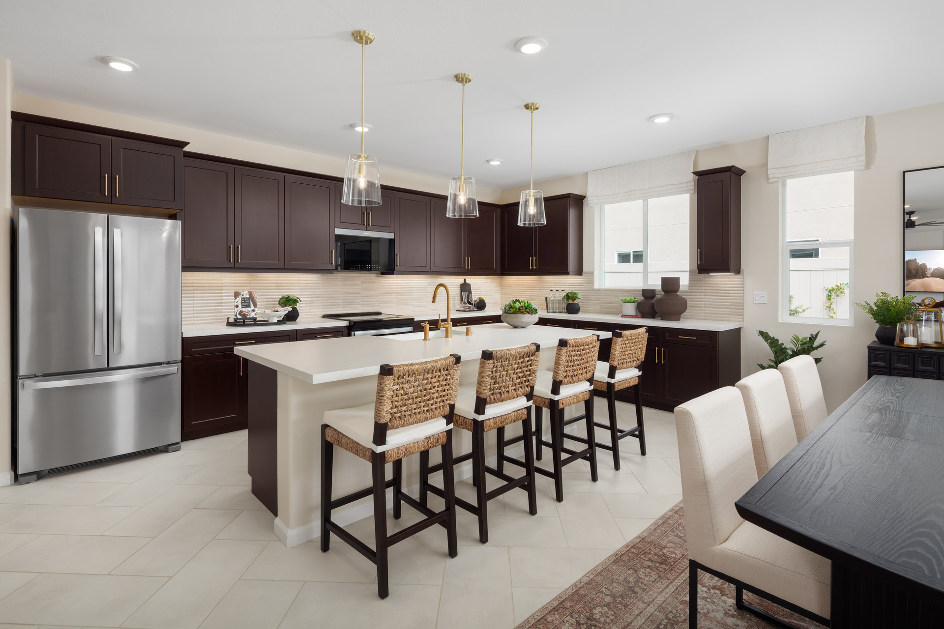 kitchen with dark cabinets and large island