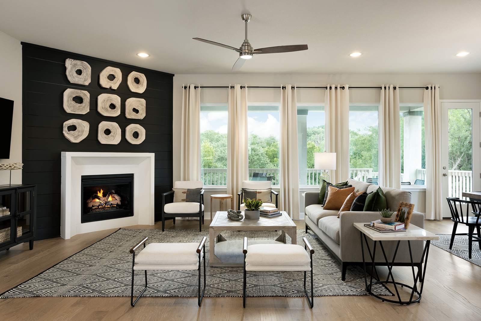 staged great room with large windows