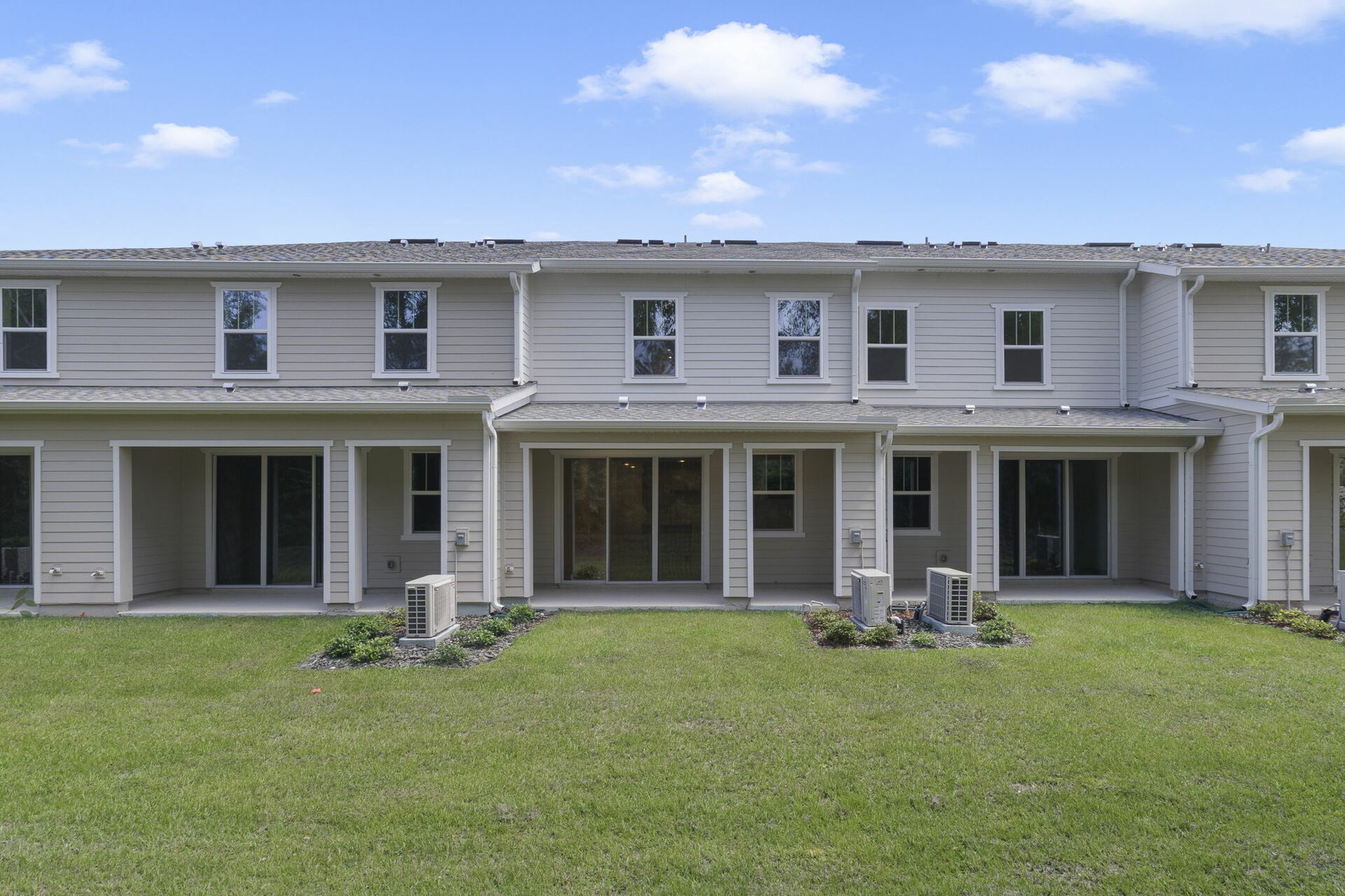 back yard with view of covered patio