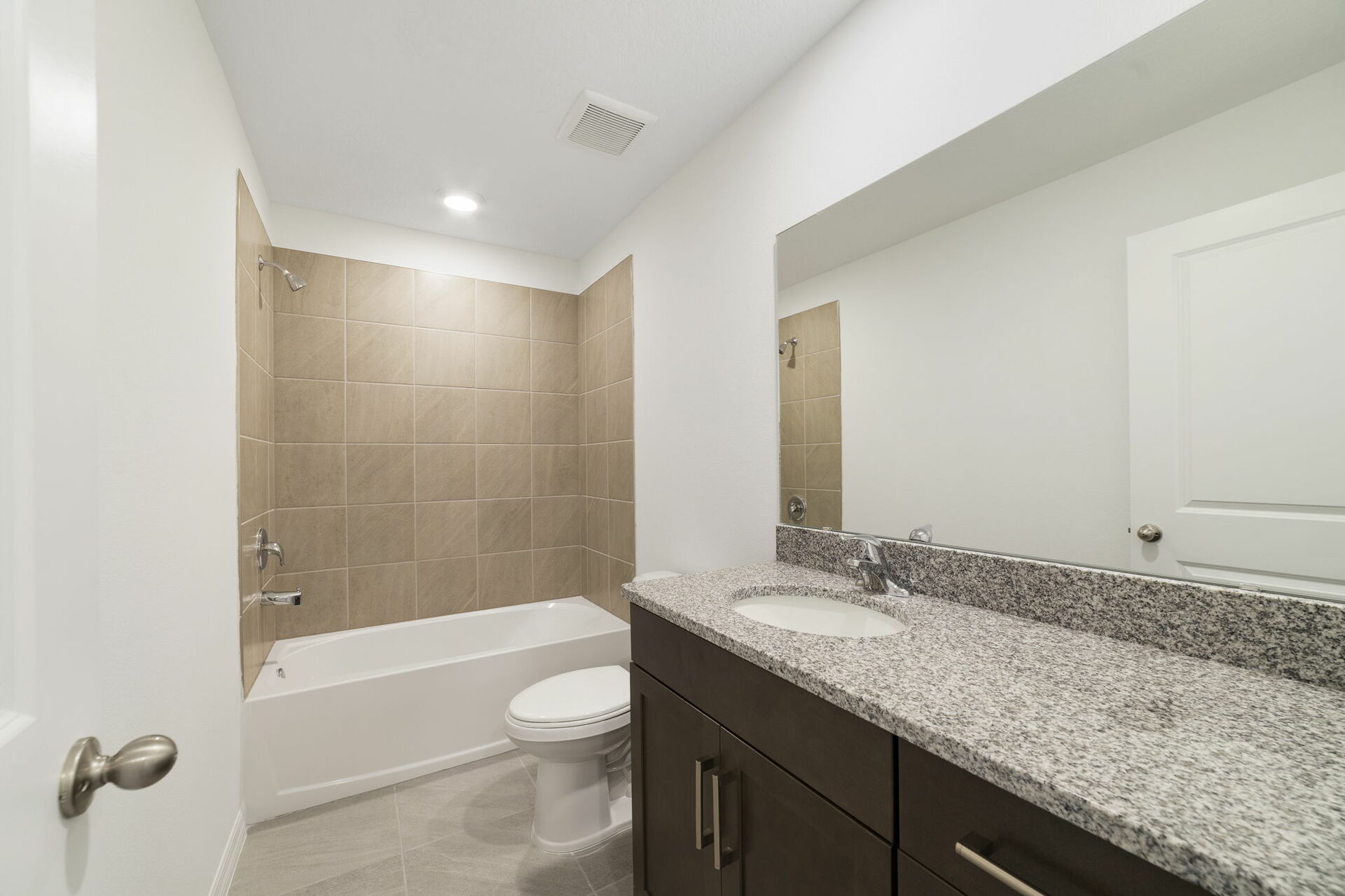 single-sink vanity water closet and shower