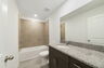 single-sink vanity water closet and shower