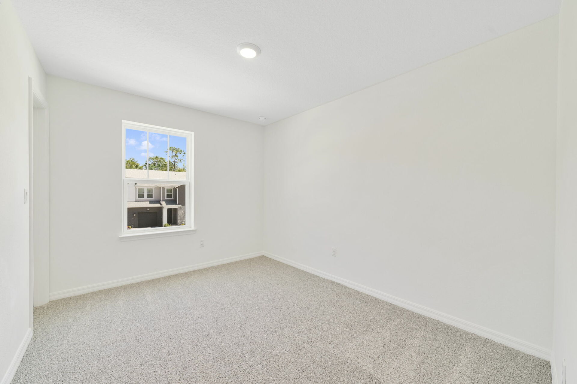 carpet throughout with single window and access to the closet