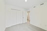 carpet throughout with single window and closet