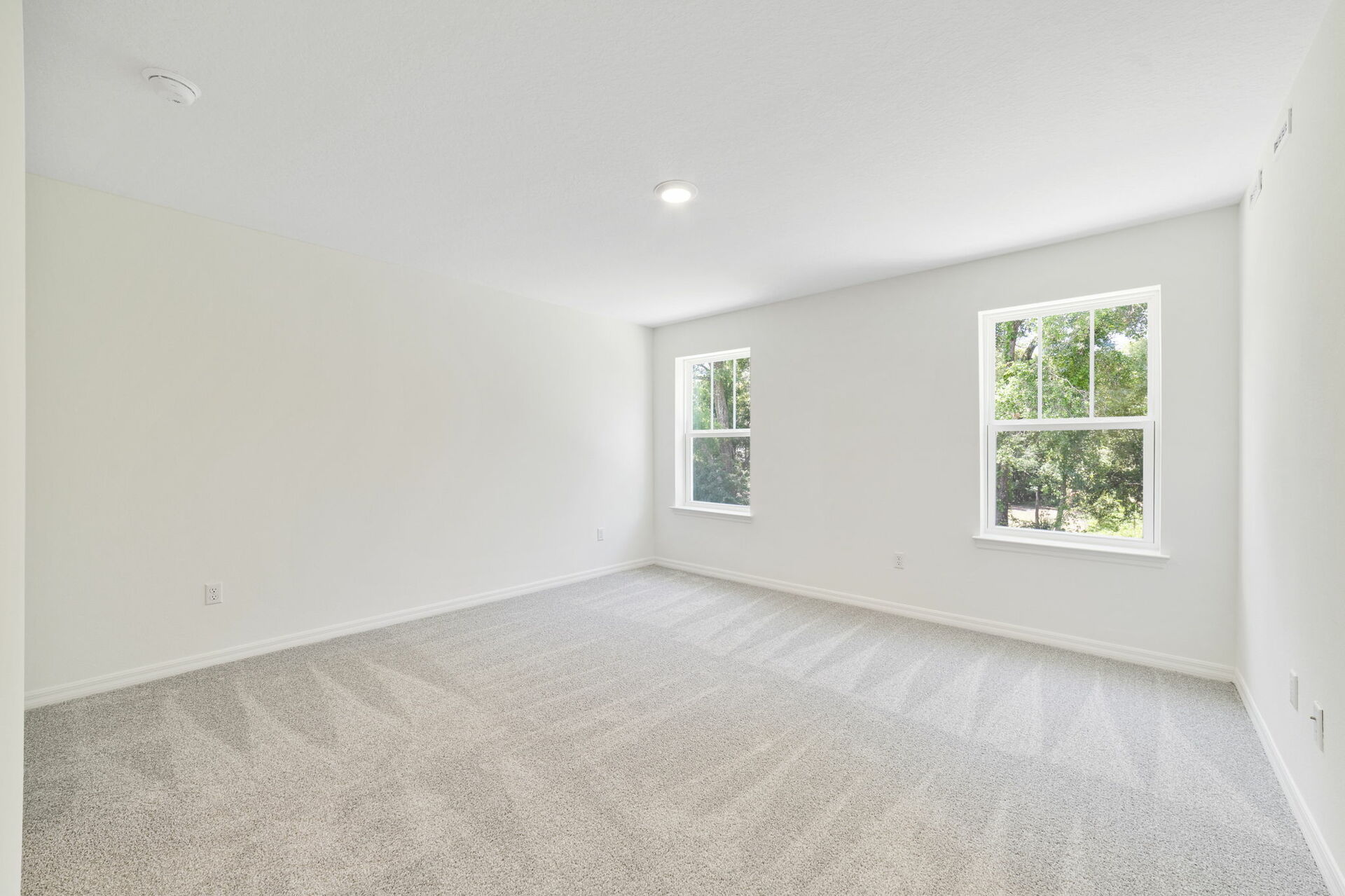 carpet throughout with dual windows and access to primary bathroom