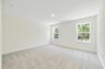 carpet throughout with dual windows and access to primary bathroom