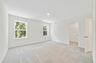 carpet throughout with dual windows and access to primary bathroom
