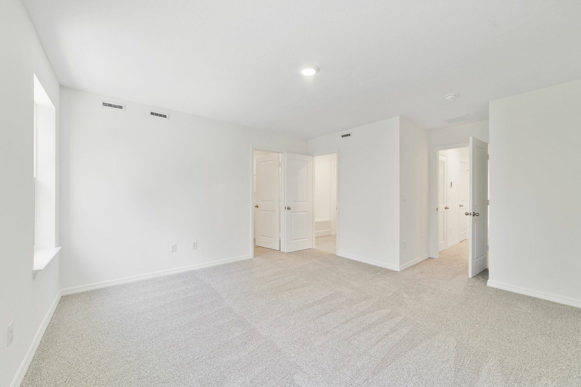 carpet throughout with dual windows and access to primary bathroom