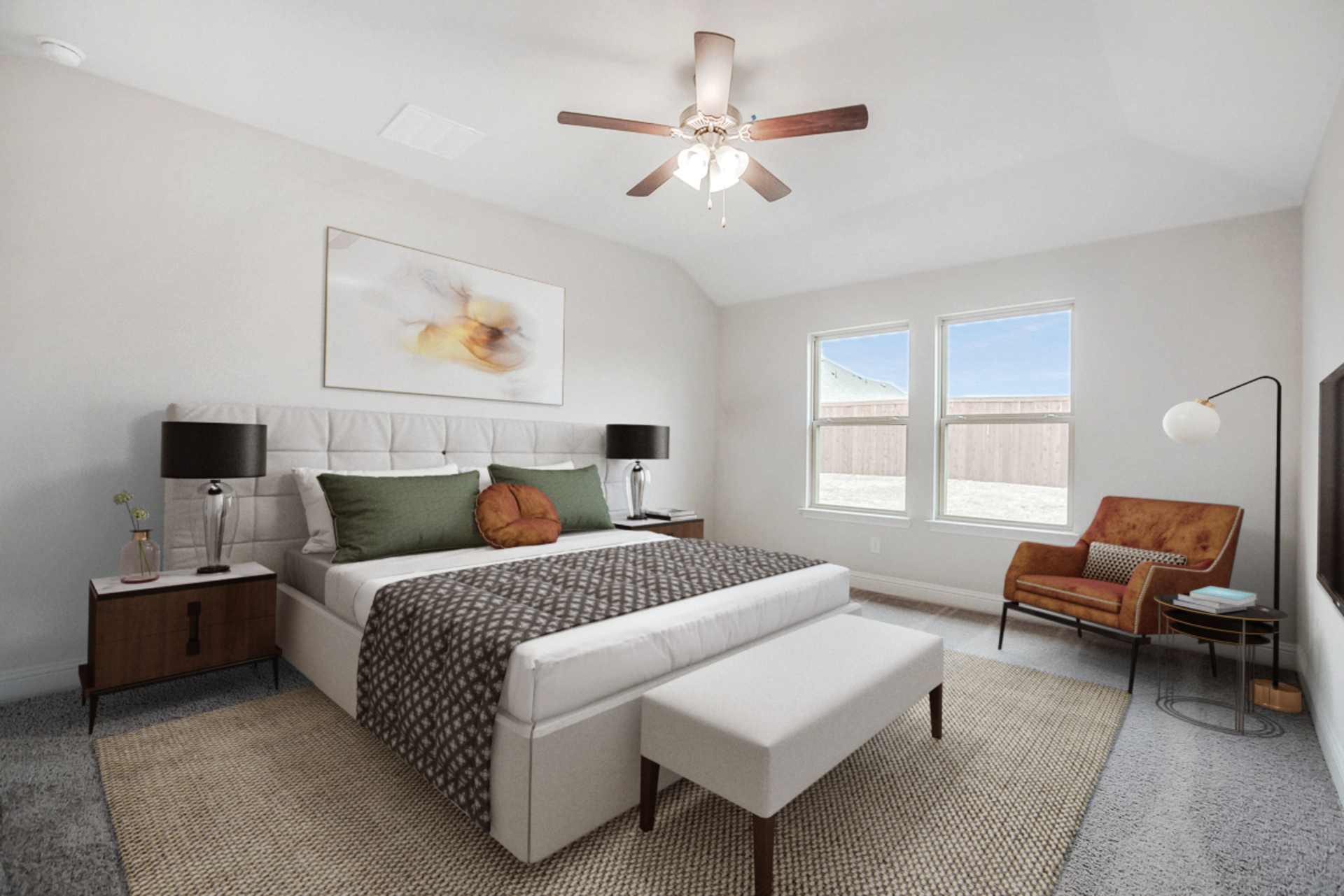 primary bedroom with large windows and carpet