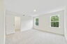 carpet throughout and multiple windows