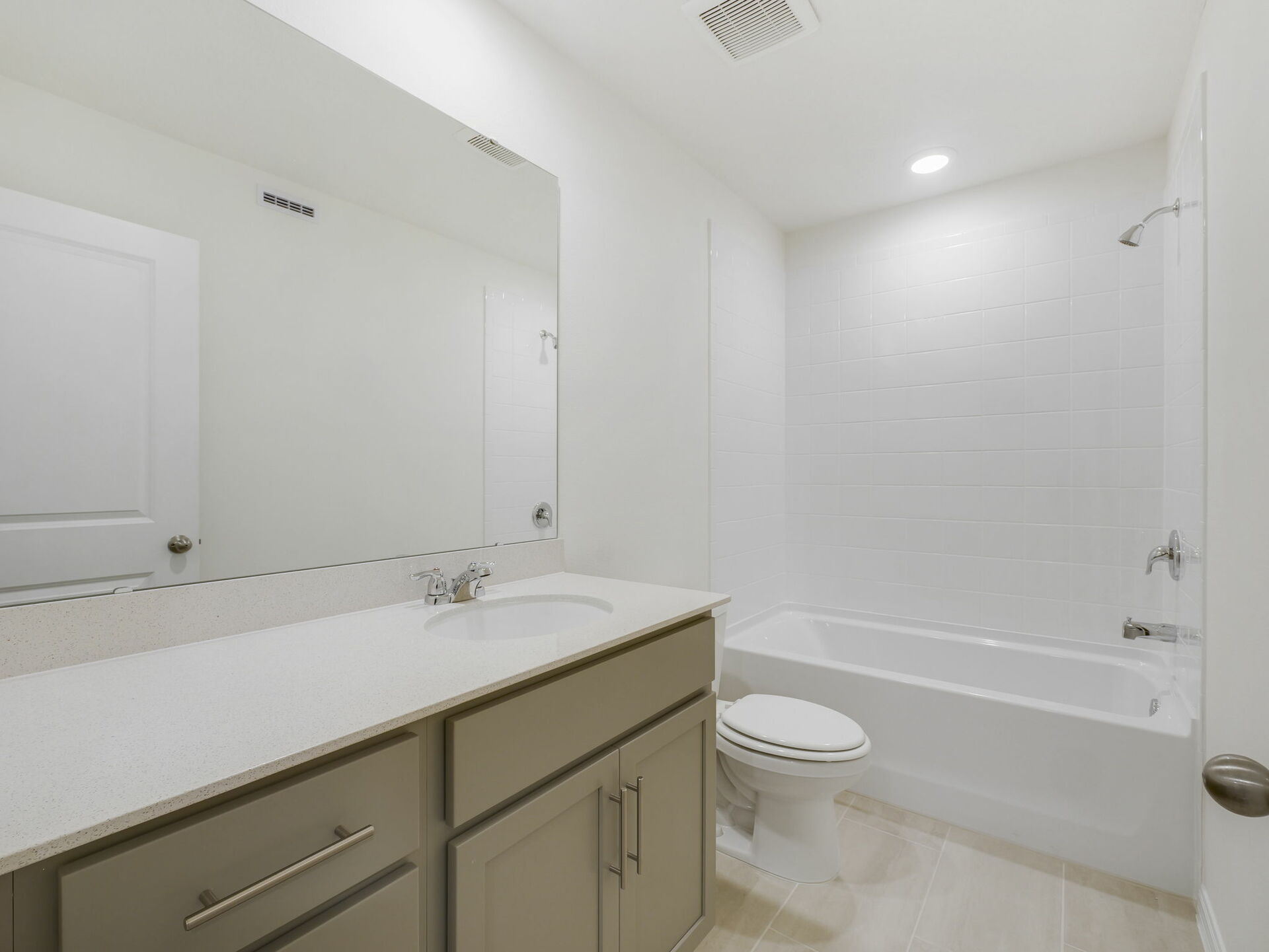 single sink vanity with water closet and shower