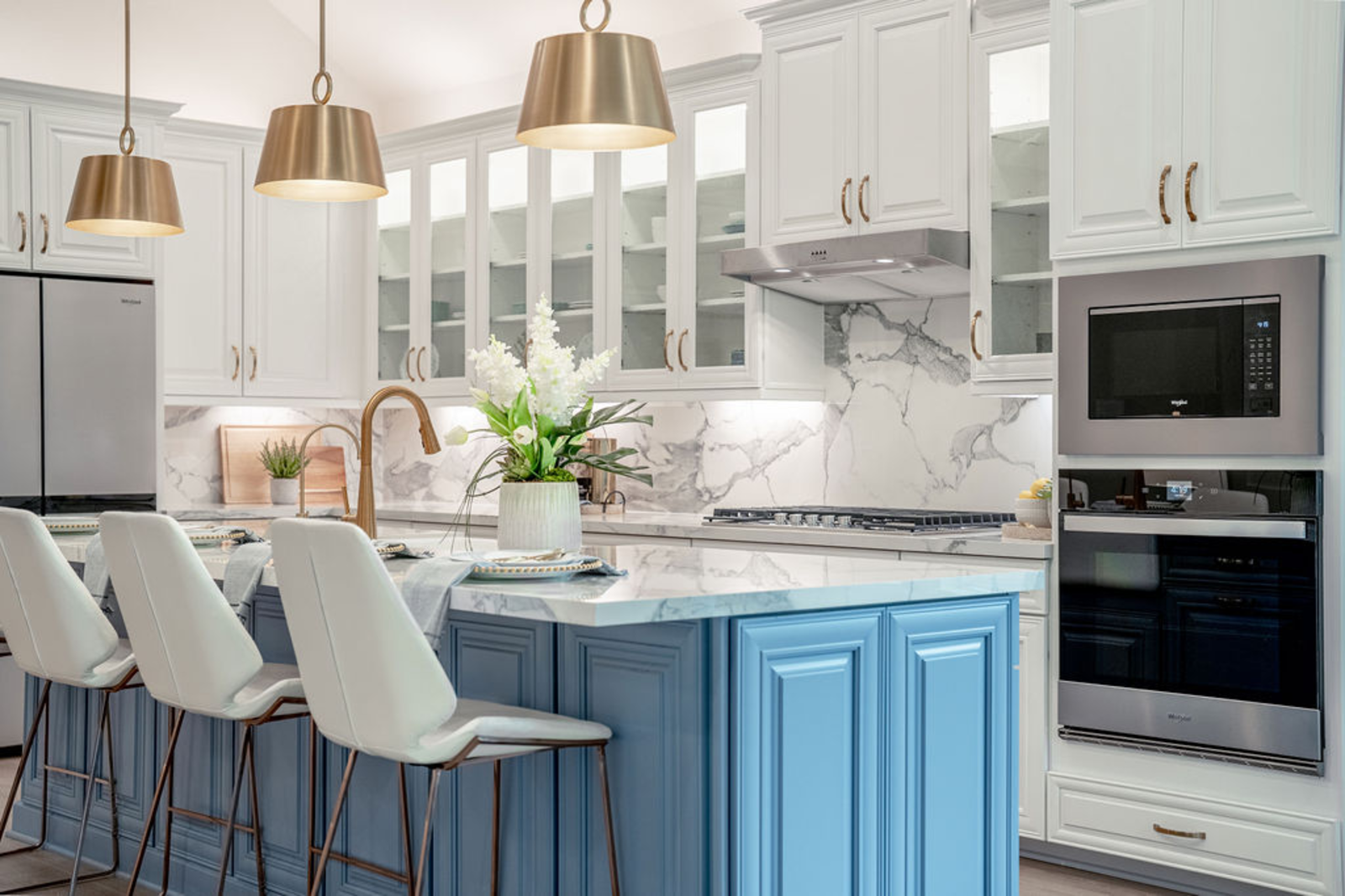 kitchen with two-toned white and blue cabinets