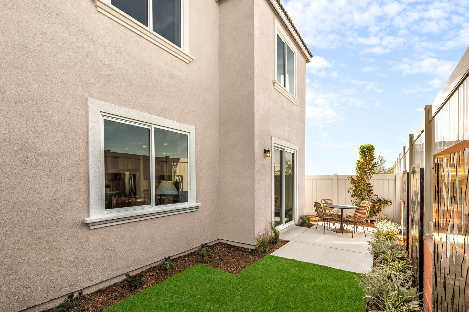 backyard with plants and seating area