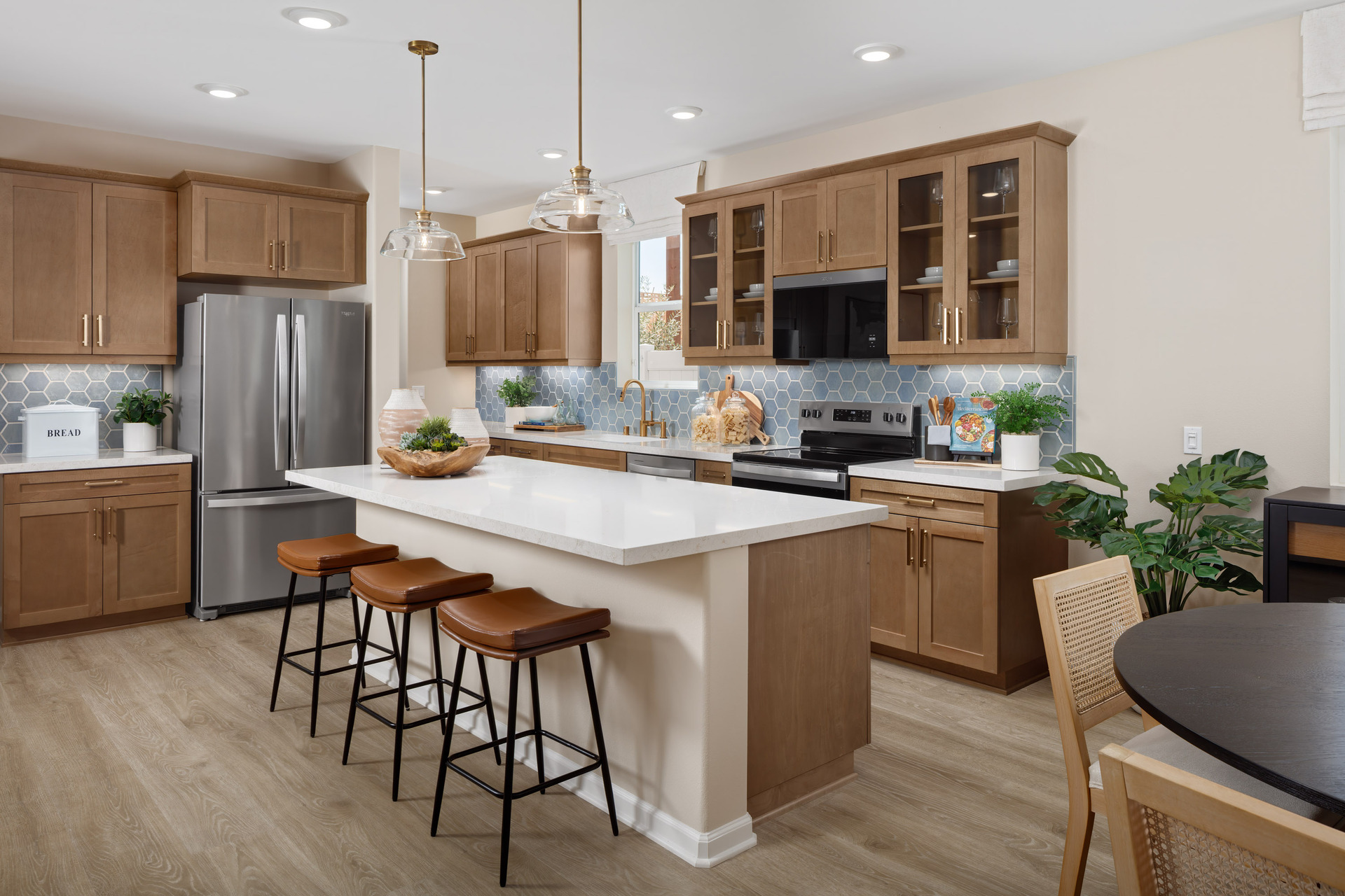 kitchen with neutral cabinets and tile backsplash