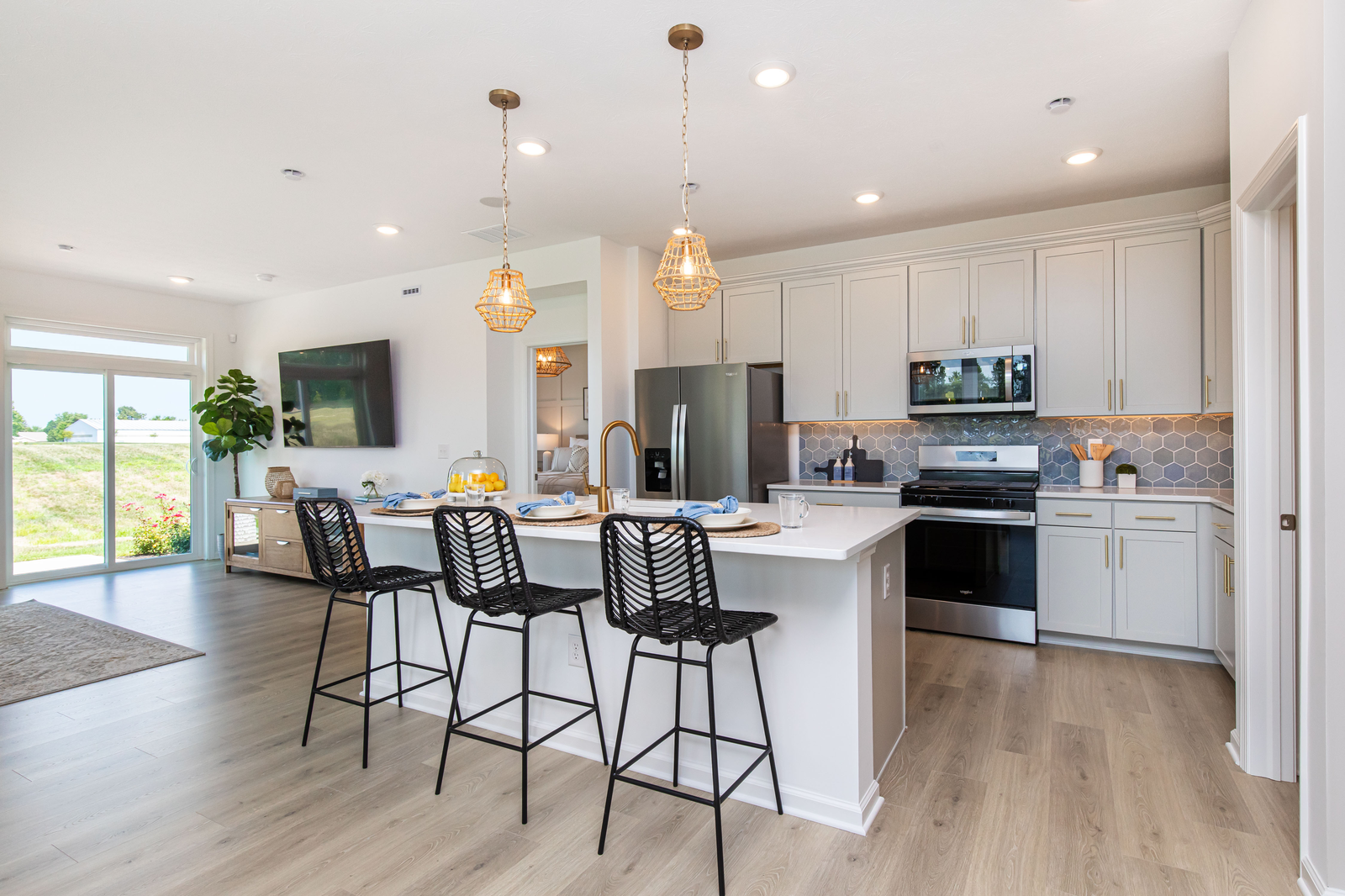 kitchen with white cabinets and tile backsplash