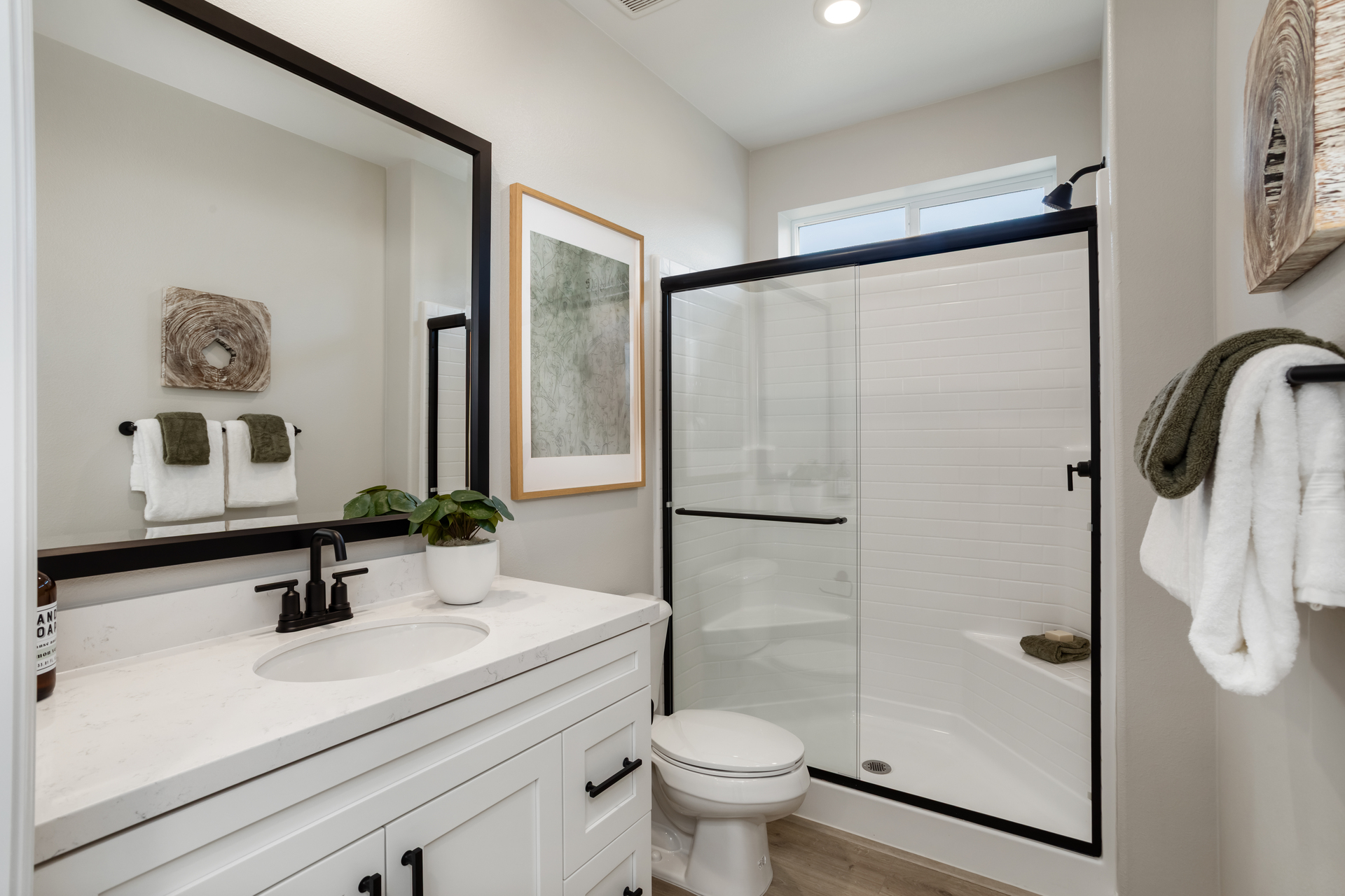 bathroom with white counters and countertops