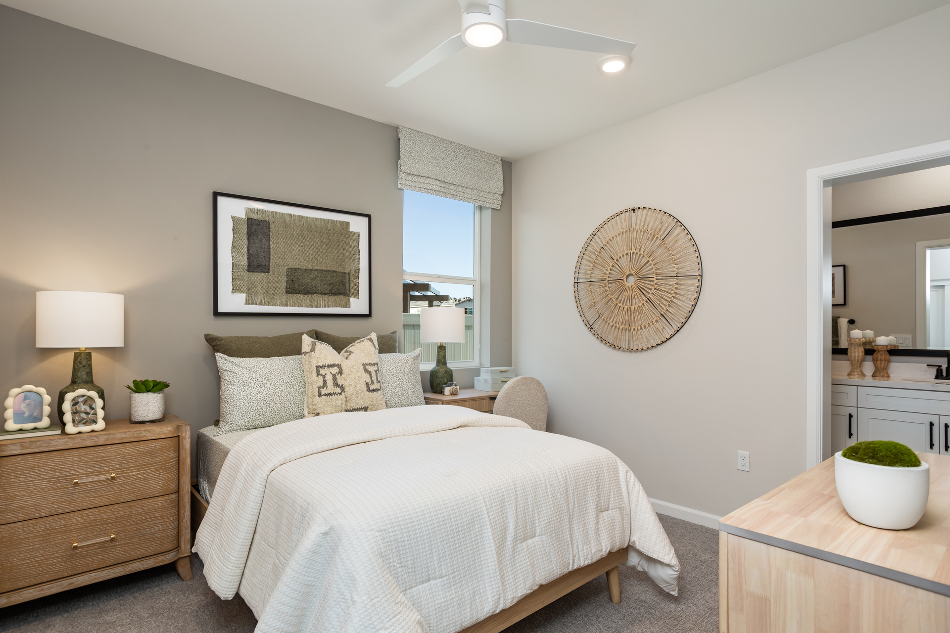 bedroom with window and neutral floors