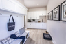 mudroom with white cabinetry and hard-surface flooring