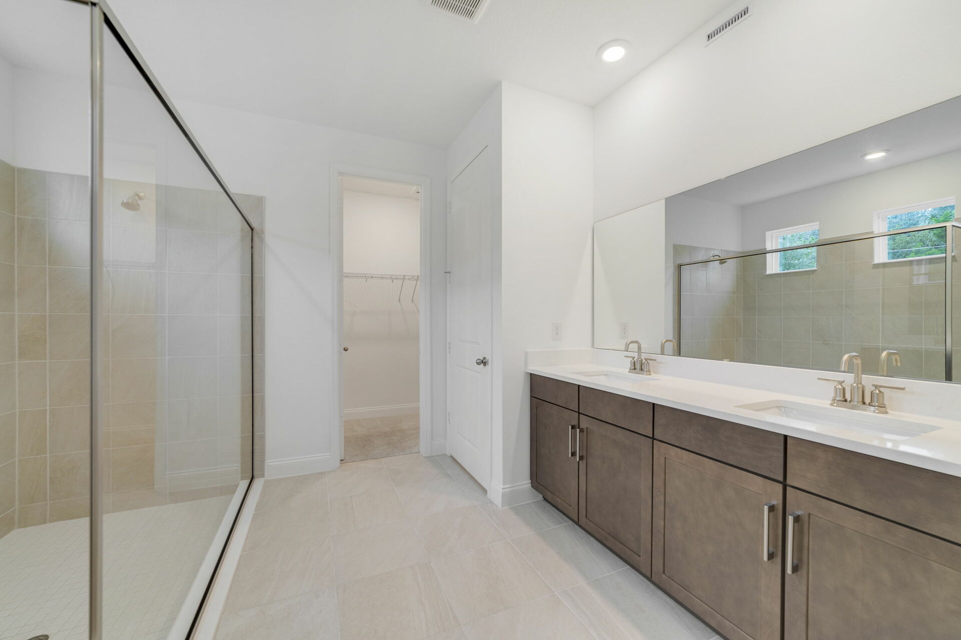 oversized shower with dual sink vanity 