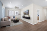 loft with neutral floors near bedrooms