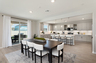 dining area with neutral floors and large windows