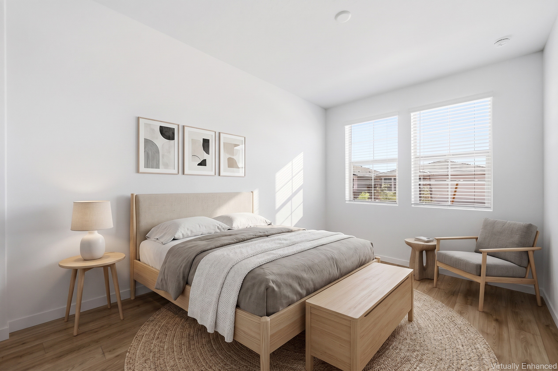 spacious bedroom with a full-sized bed, an oak nightstand, a beige rug, and an oak accent chair
