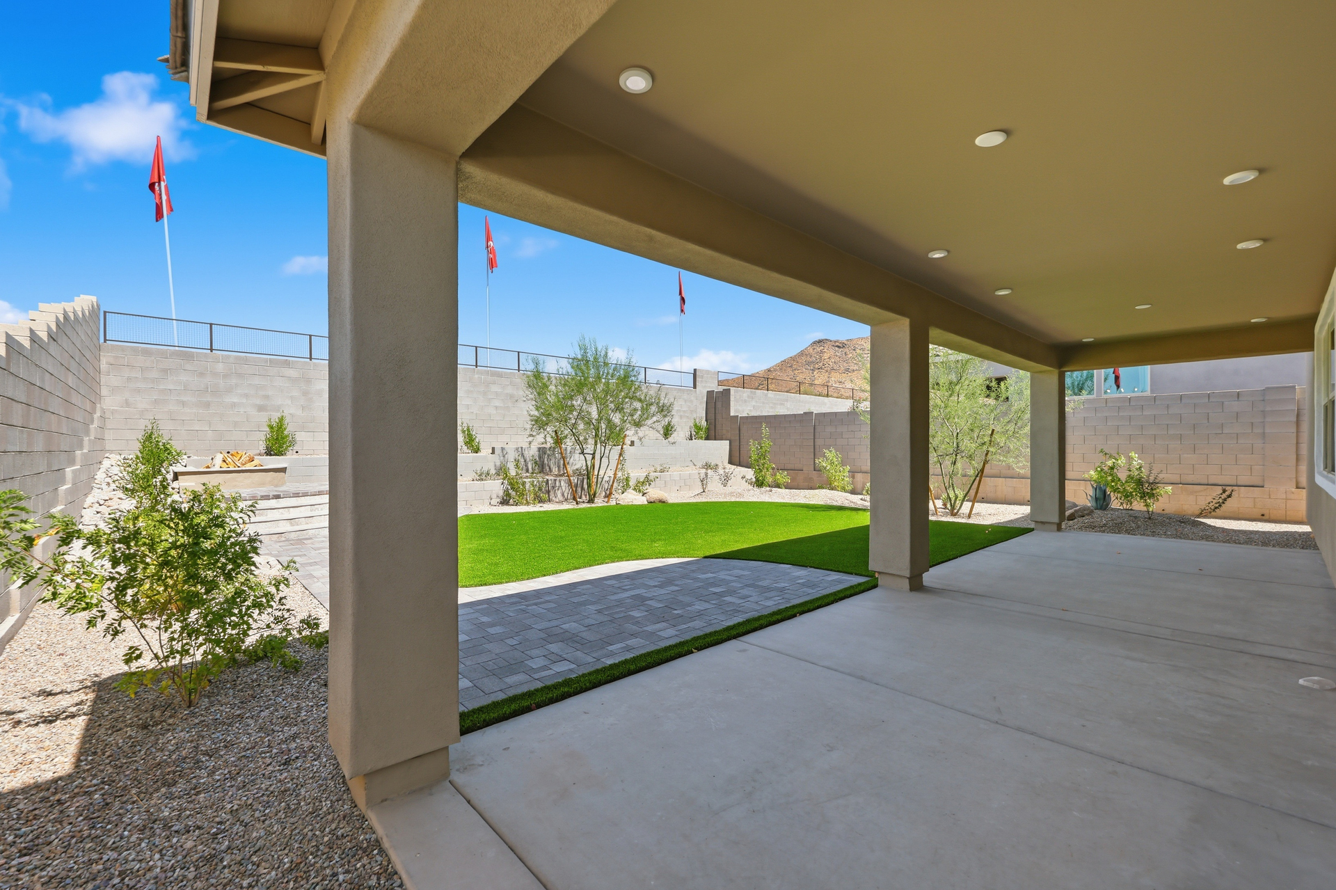 extended covered patio with recessed lighting, perfect for relaxing and hosting gatherings