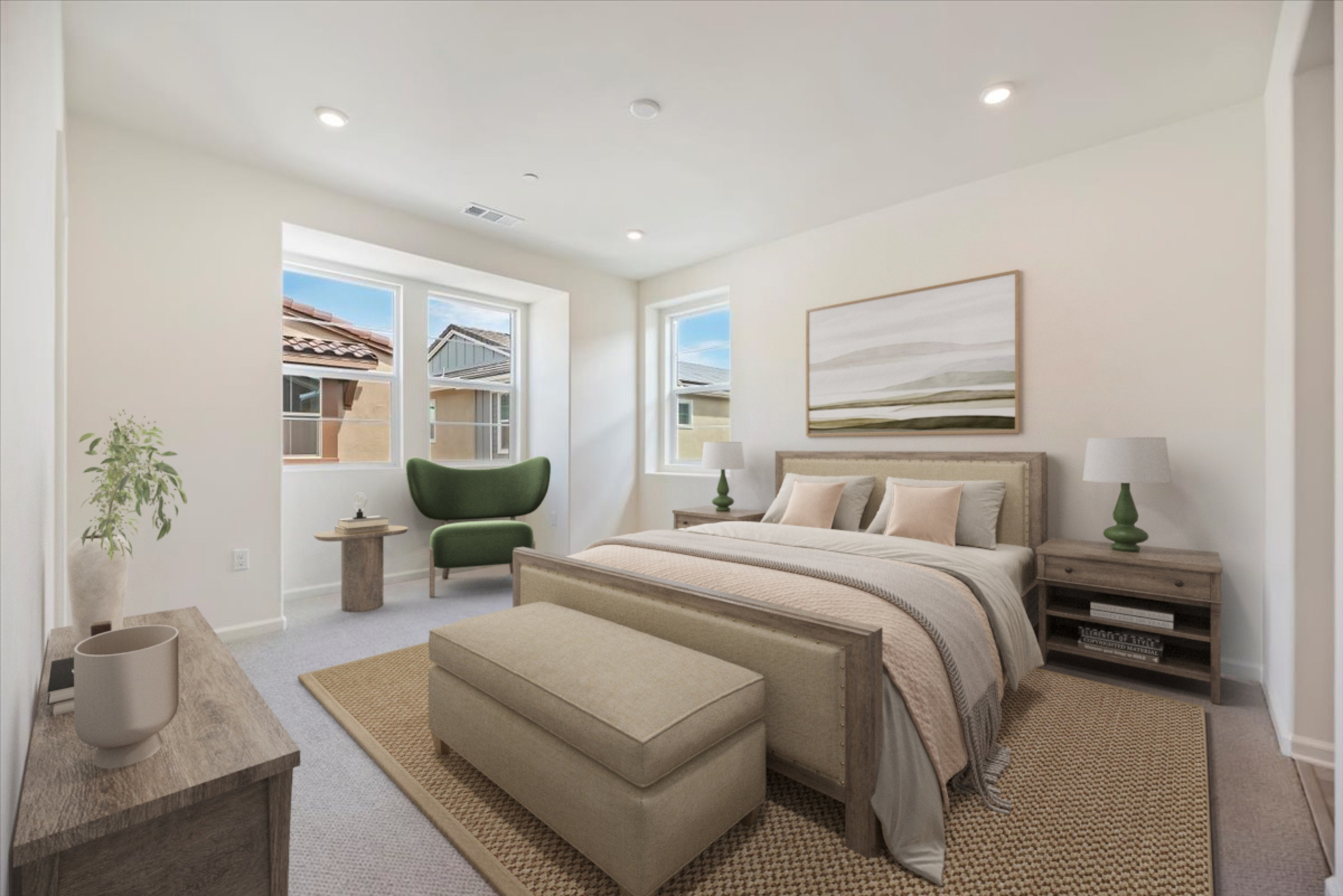 large bed with a dresser and two nightstands