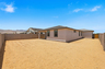 spacious dirt backyard ready to become a desert oasis 