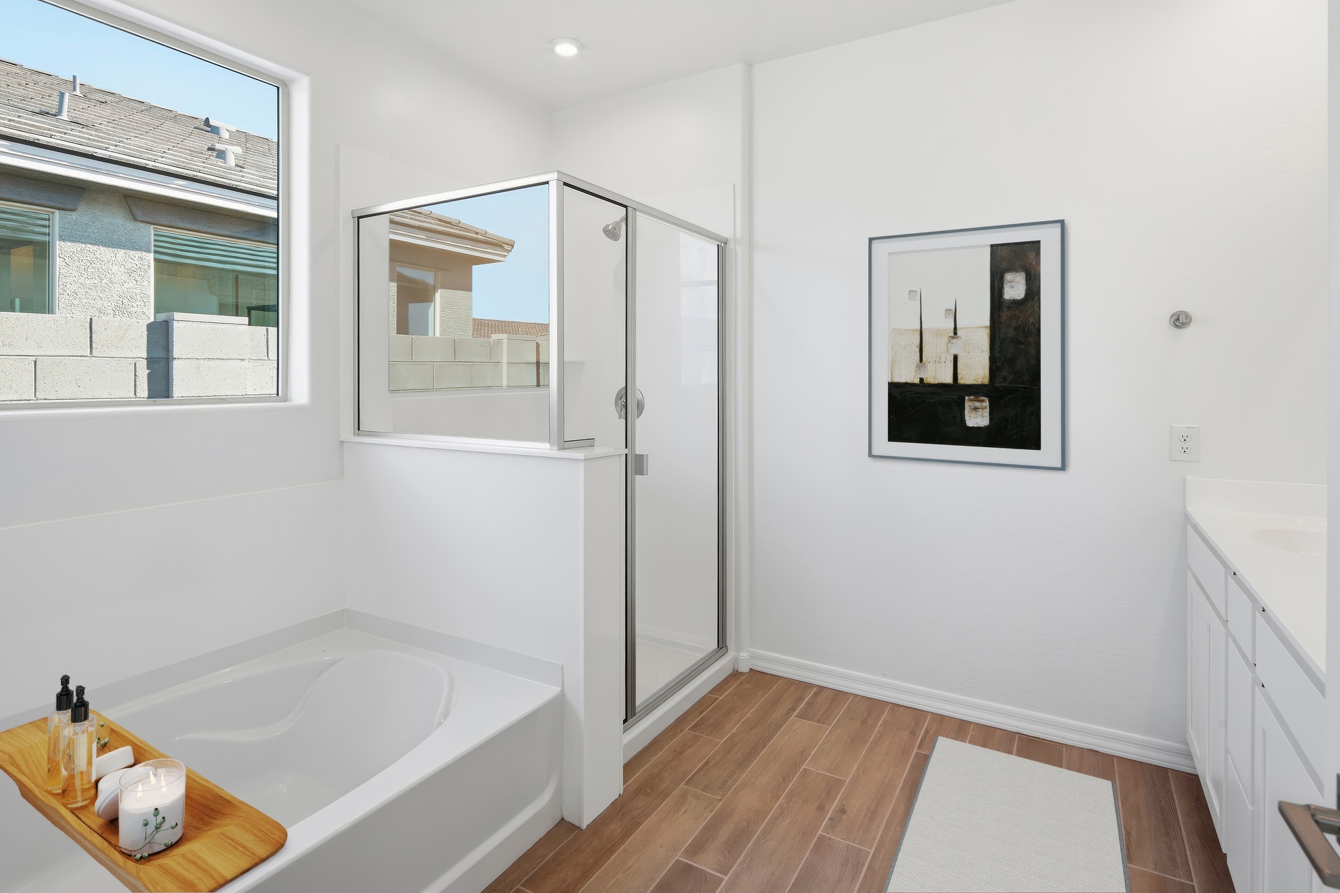 spacious bathroom with a soaking tub to relax and a walk-in shower