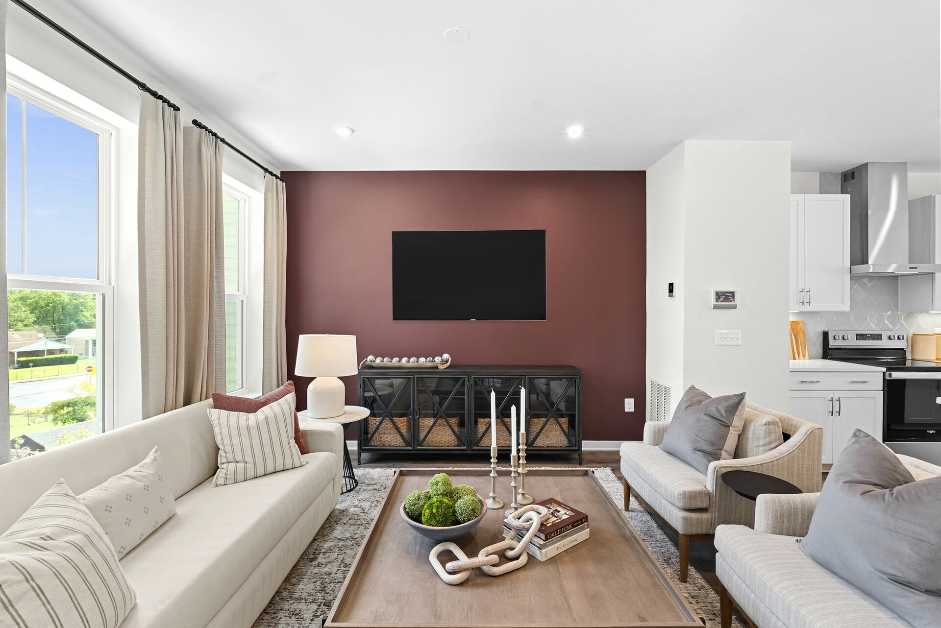 great room with solid flooring & lots of light