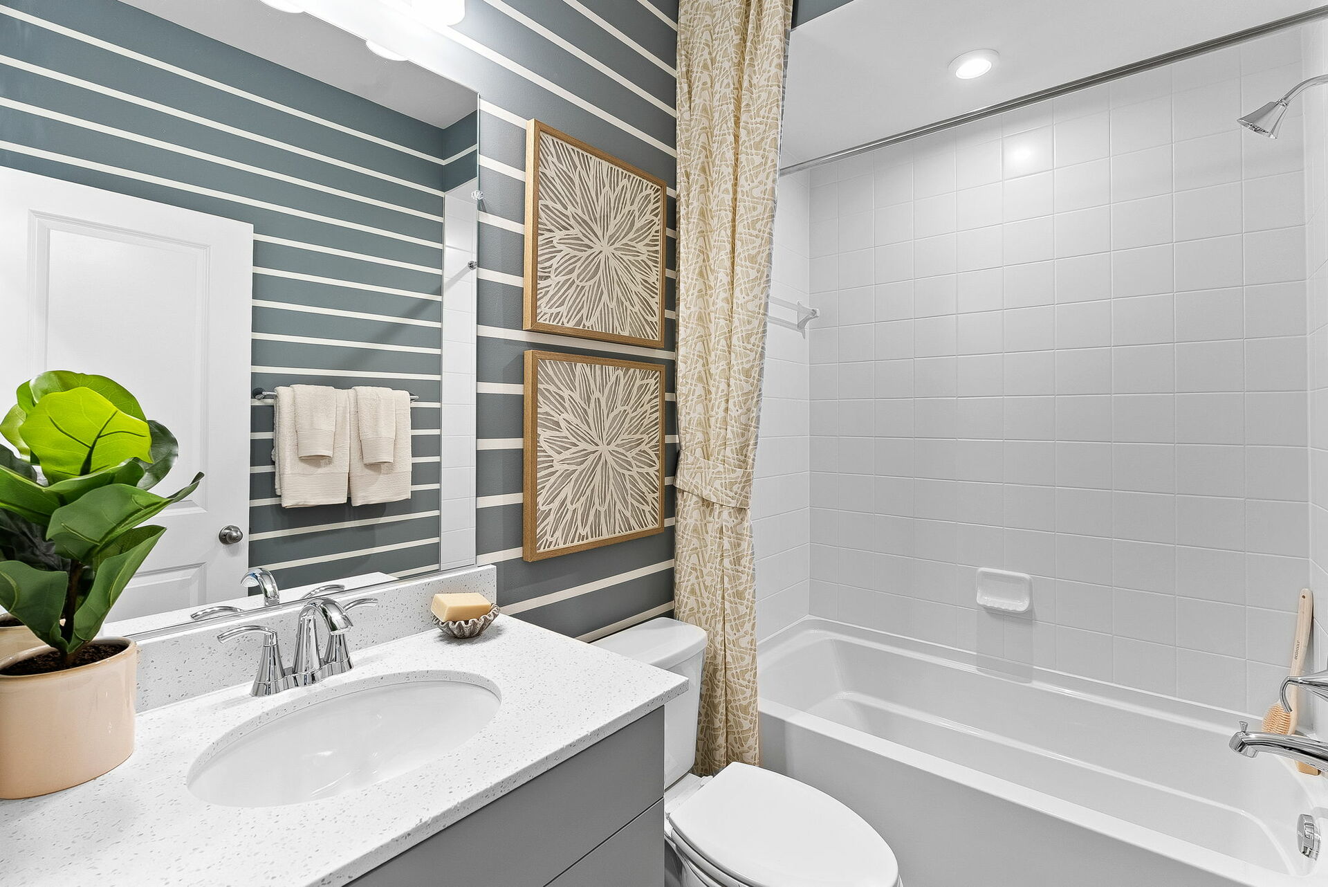 bathroom with sink, toilet, tub