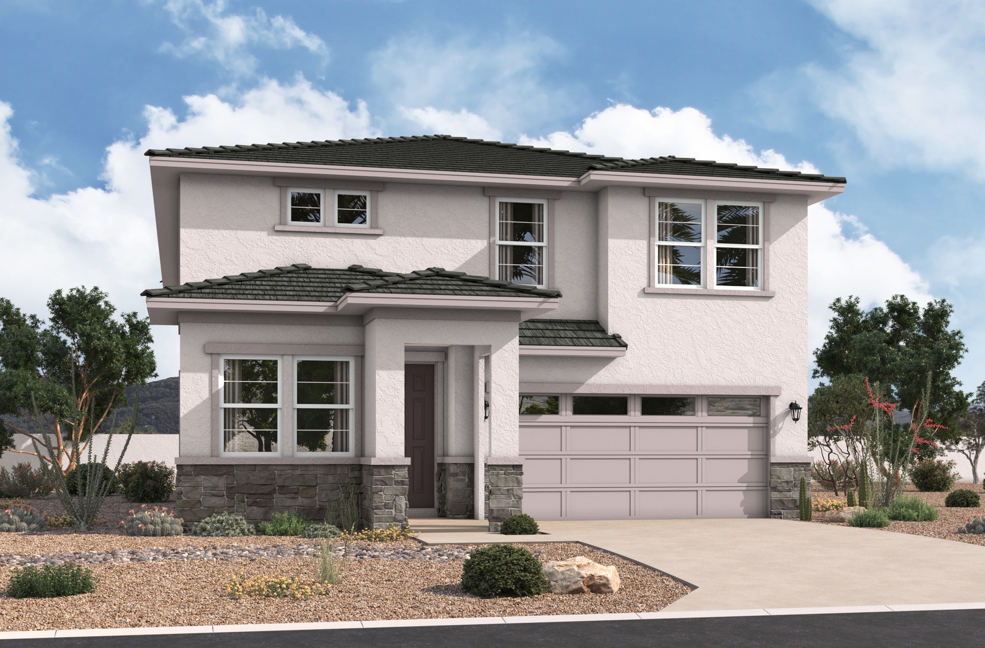 two-story home with desert landscaping and concrete driveway