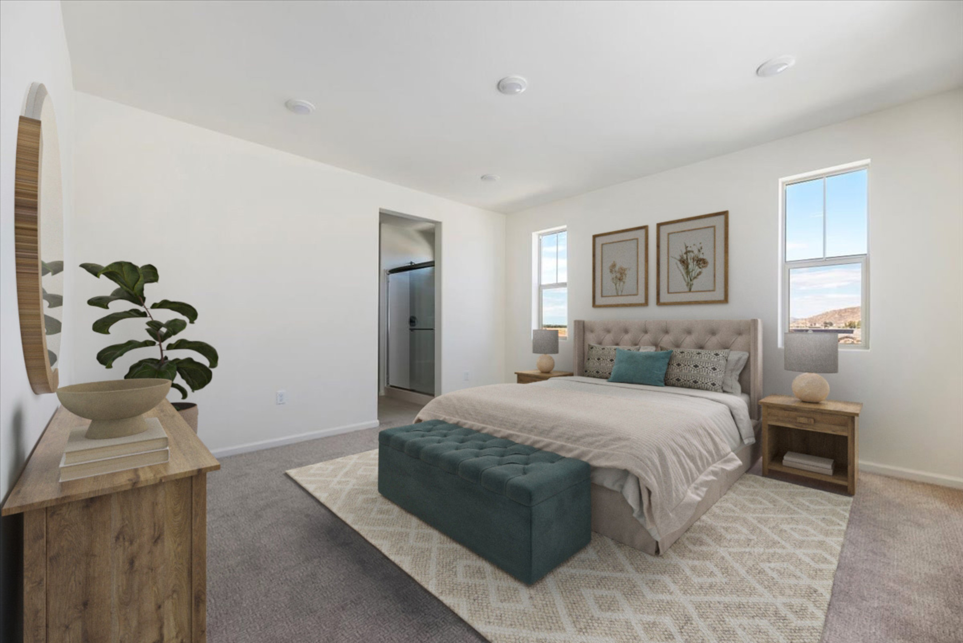 primary bedroom with a large bed and nightstands