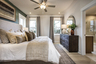primary bedroom with king bed and ensuite bath