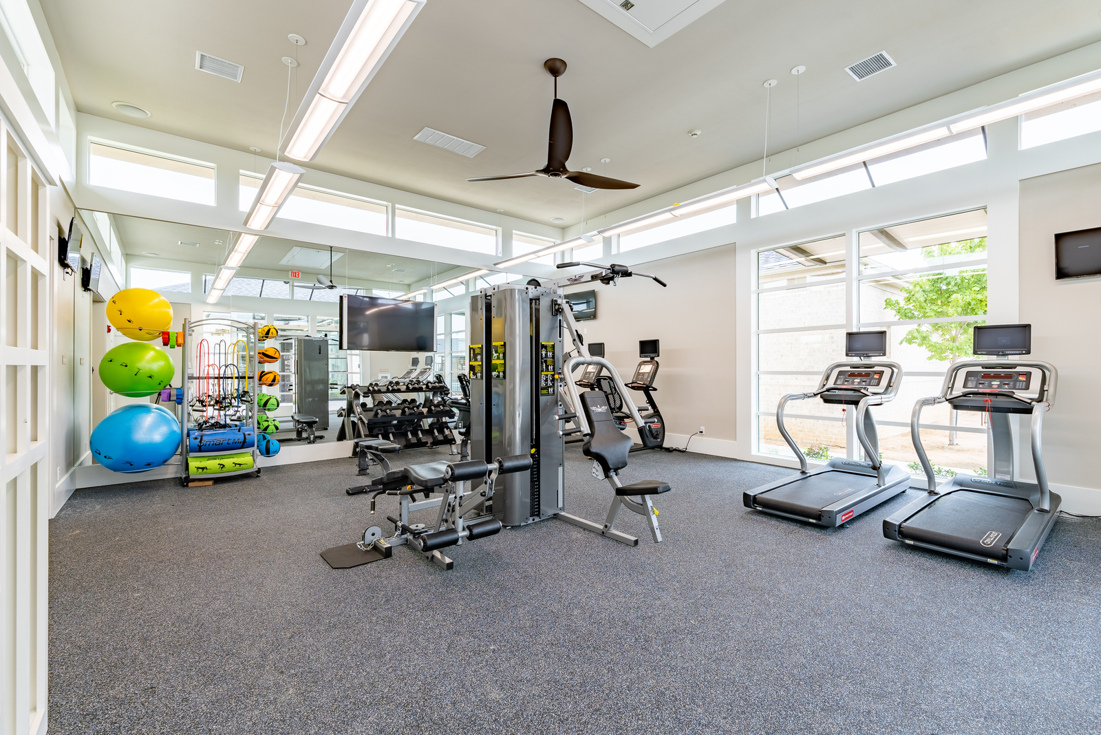 fitness center with workout equipment