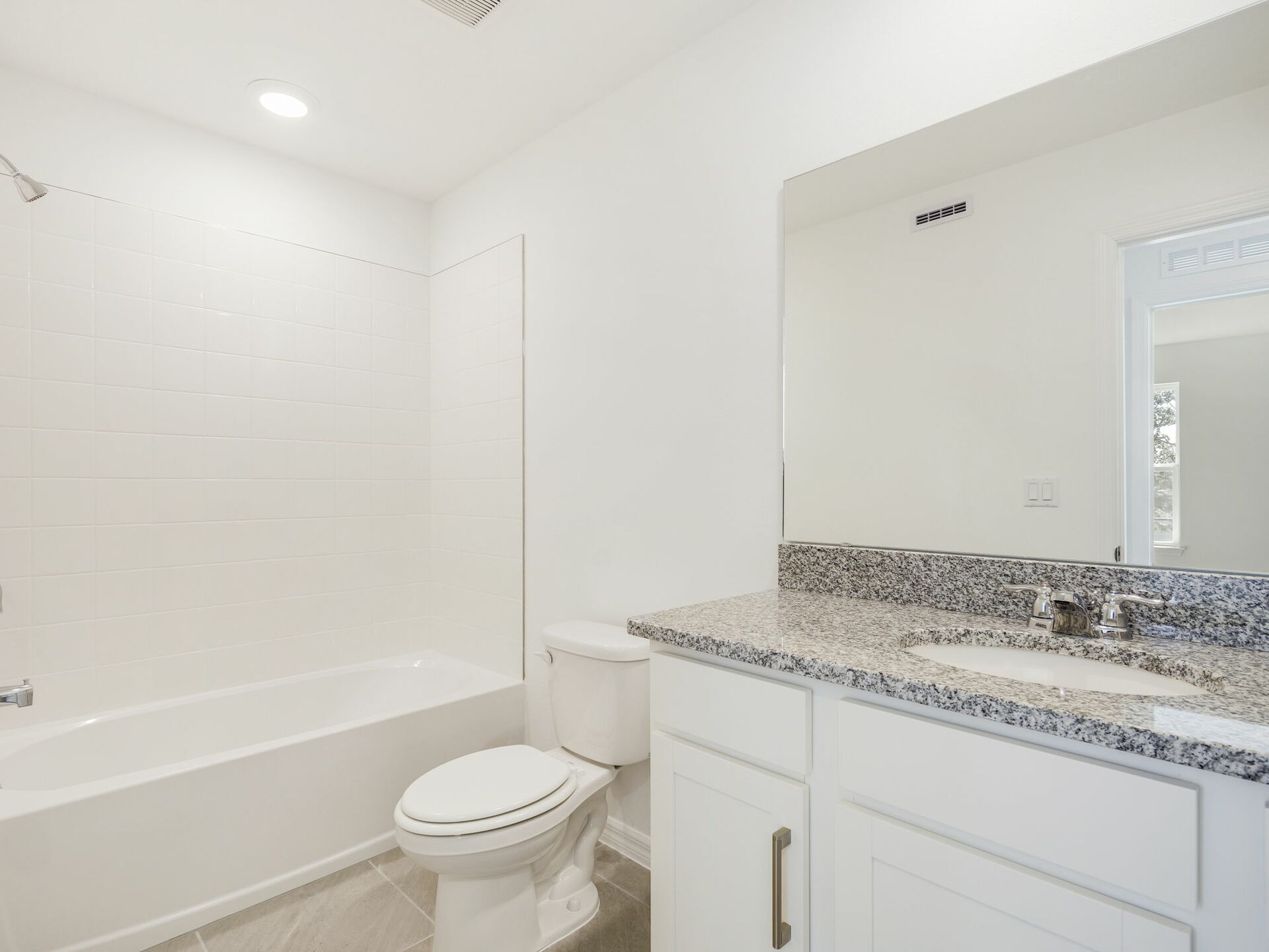single sink vanity with water closet and shower