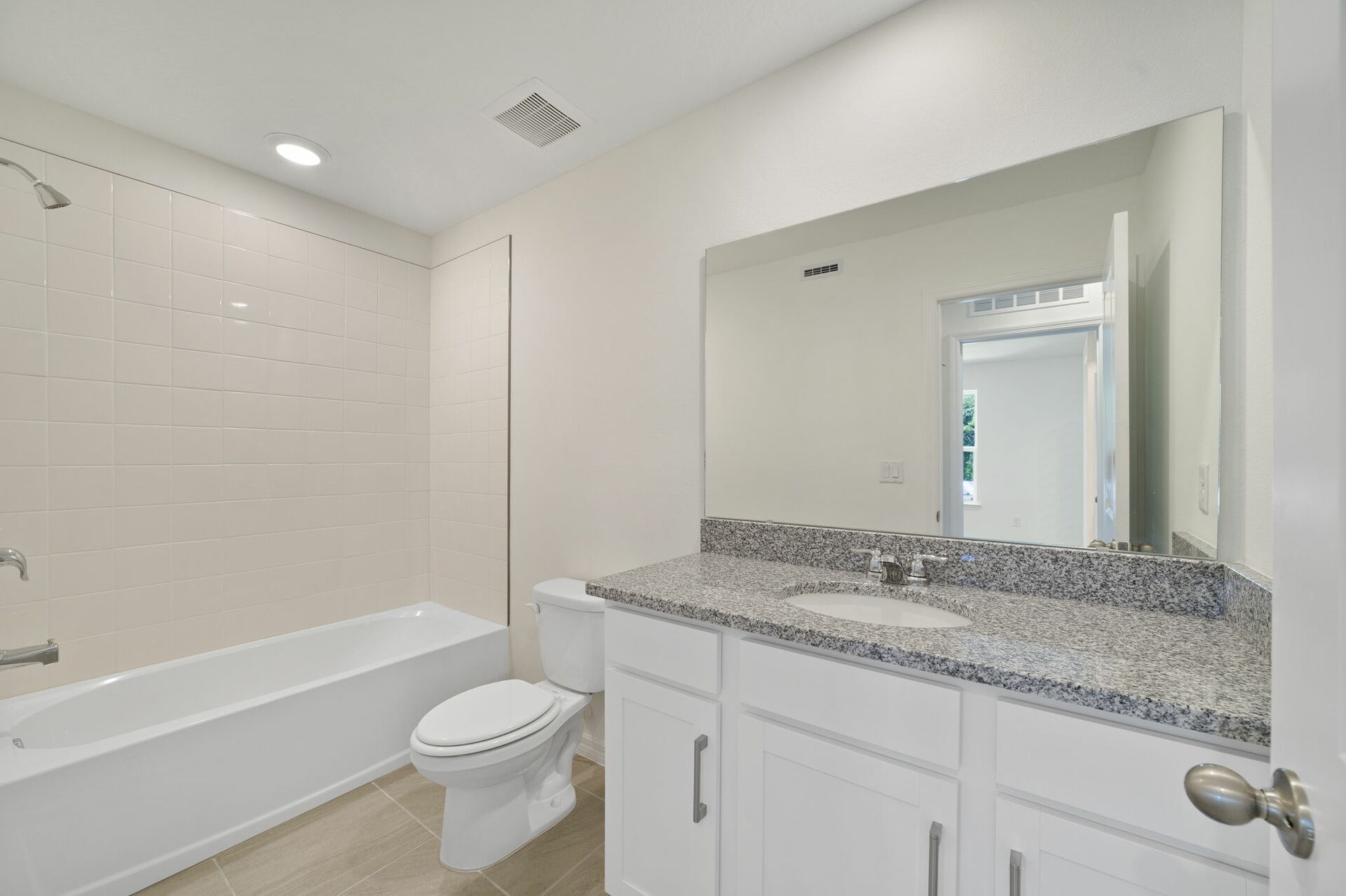 single sink vanity with water closet and tub