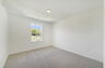carpet throughout with a closet and a single window