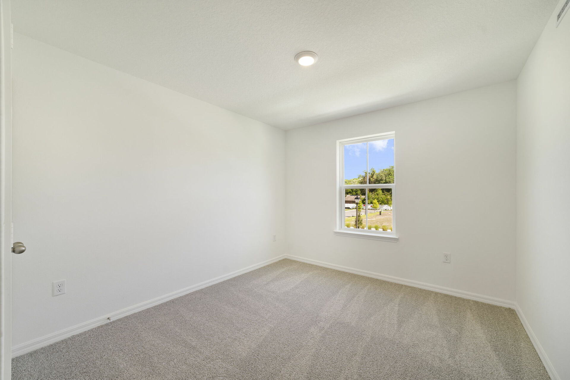 carpet throughout with a closet and a single window