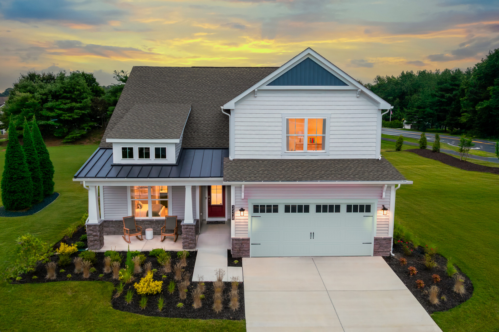 2-story single-family home exterior at dusk