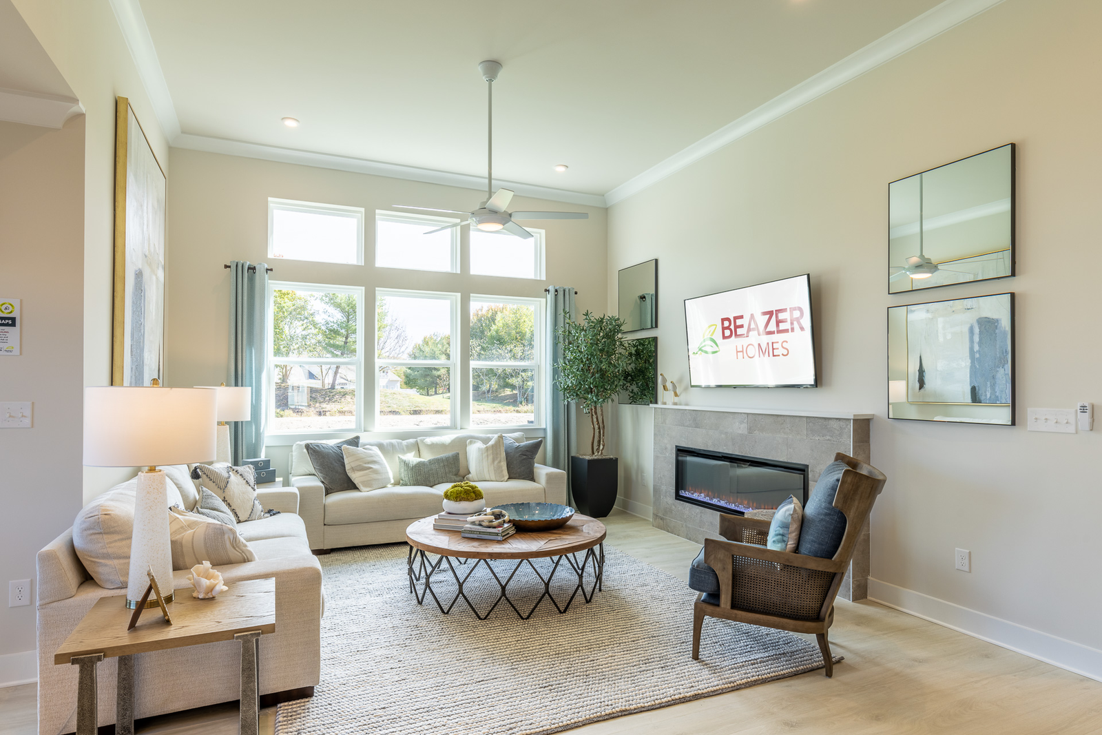 great room with 2 couches and a fireplace