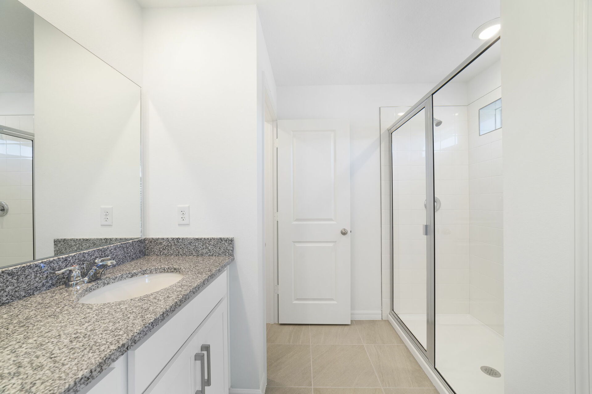 dual sink vanity with mirror and shower