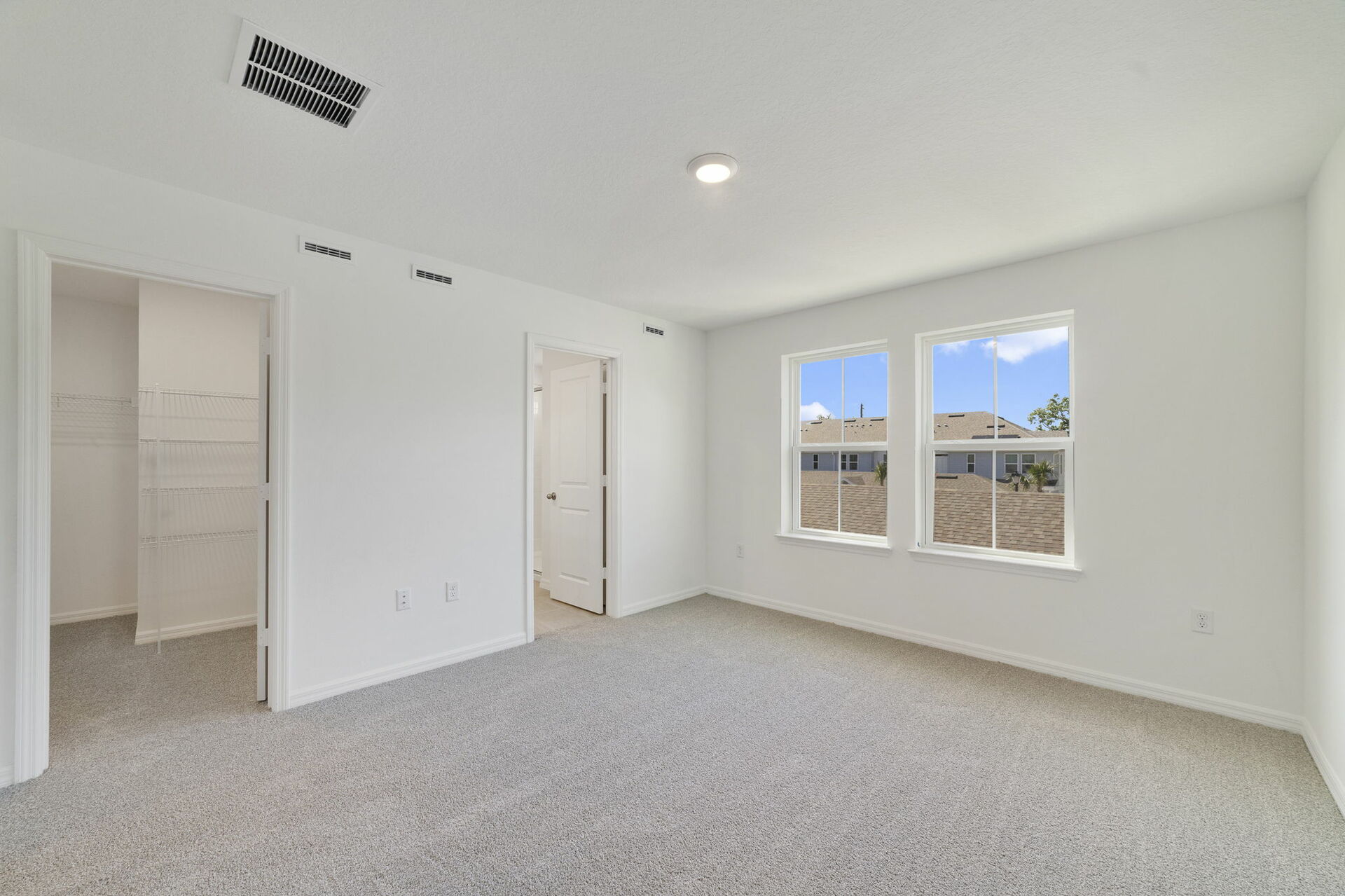 carpet throughout and large double window